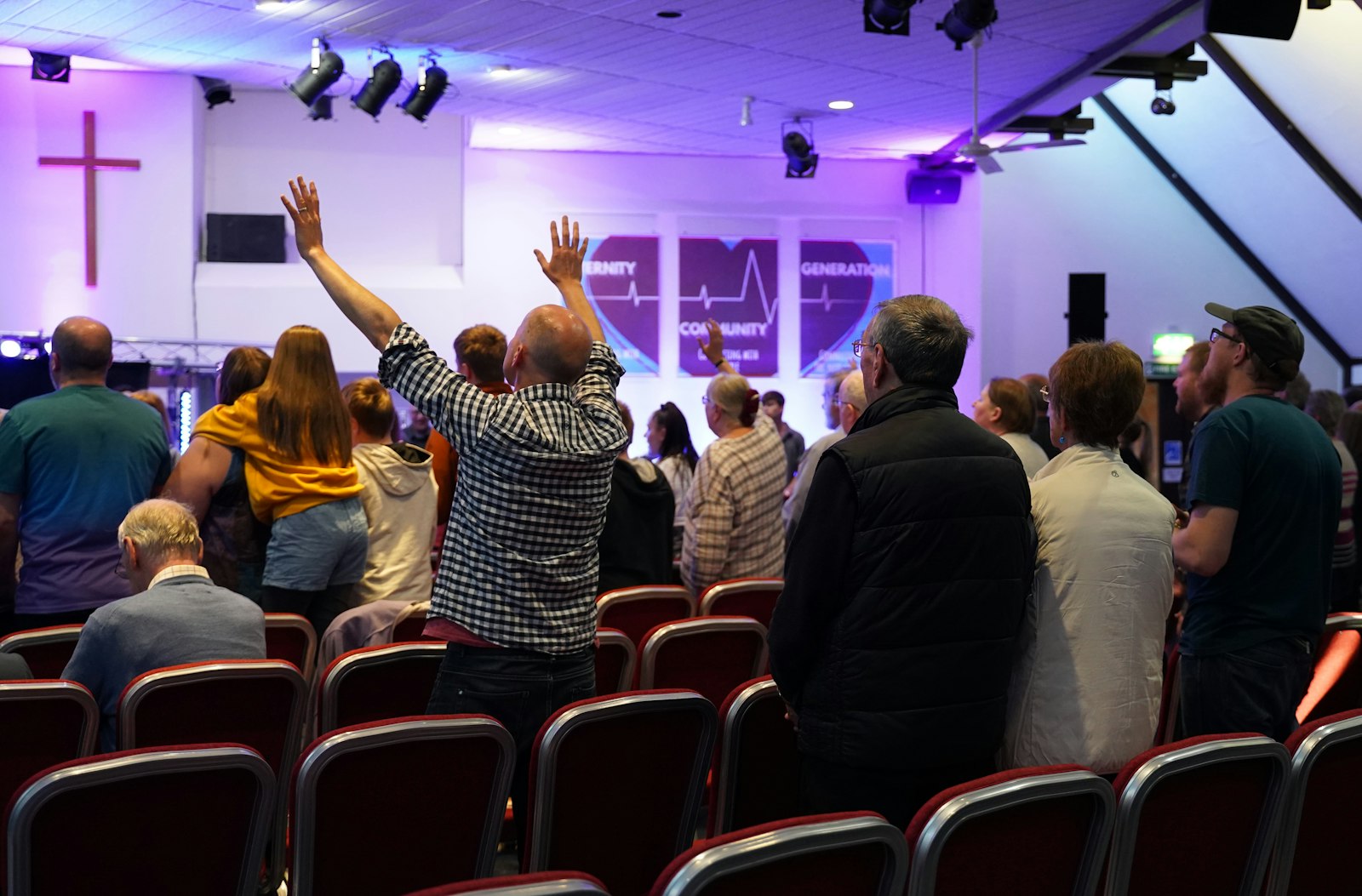 Congregation worshiping together during a church service